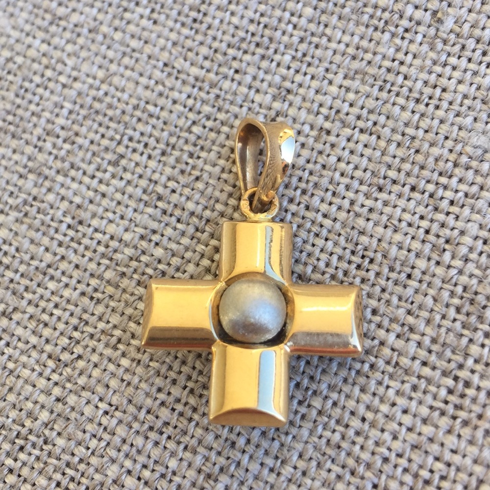 Gold plated cross pendant.